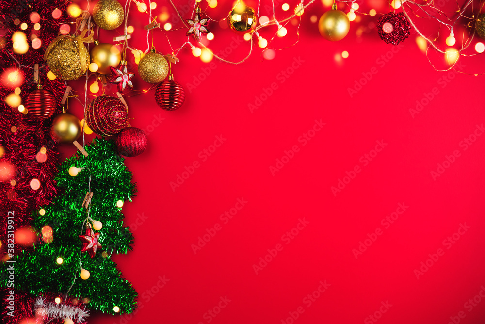 Christmas decoration balls and ornaments over abstract bokeh background with copy space. Holiday background greeting card for Christmas and New Year. Merry Christmas