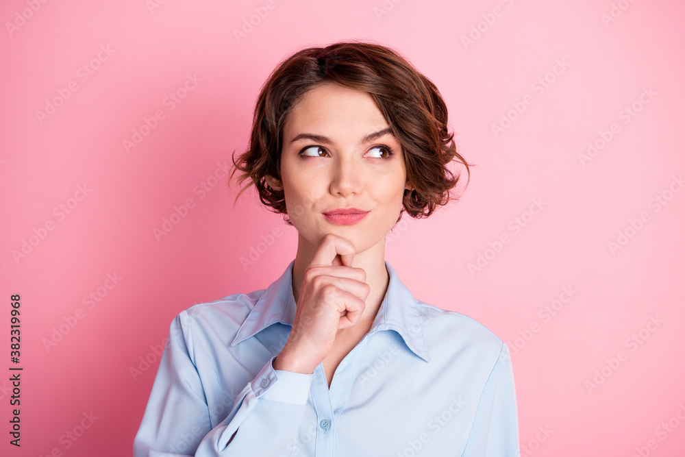 Closeup photo of attractive pretty charming lady good mood smiling tricky arm on chin look side empty space cunning clever person wear blue office shirt isolated pink pastel color background Closeup photo of attractive pretty charming lady good mood smiling tricky arm on chin look side empty space cunning clever person wear blue office shirt isolated pink pastel color background
