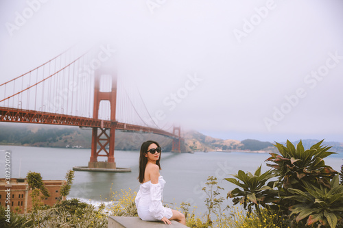 Girl at the golden gate bridge © youli