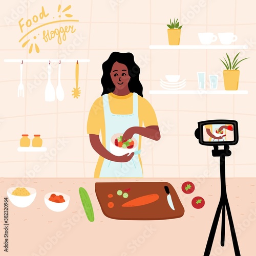 Black african Food blogger. Female chef make salad in kitchen while recording video using camera online video channel. Cook healthy food at home. homemade meals. culinary video master. Vector