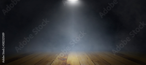 Empty wooden plank floor with smoke float up on dark background  used as a studio background wall to display your products.