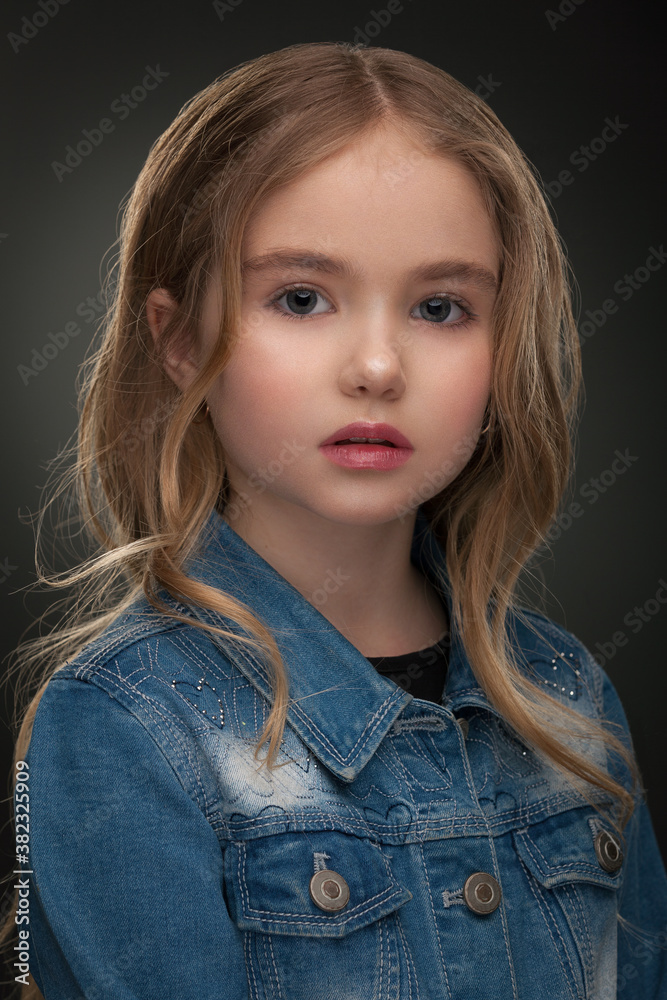 portrait of a beautiful little blonde girl close up portrait of a beautiful little blonde girl close up