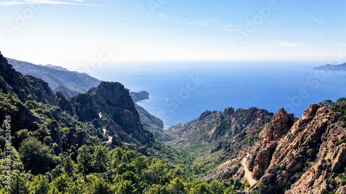 view of canyon with mountains, trees and street