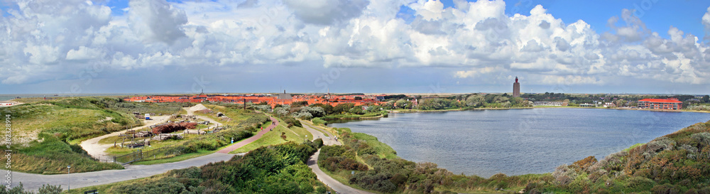 Panoramic view on Westkapelle, Zeeland, Netherlands, with a creek created when the sea broke through the coastal defence