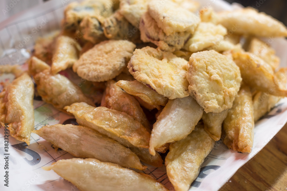 Vegetable fritters are a popular tempura in korea. Vegetable fritters are a popular tempura in korea.