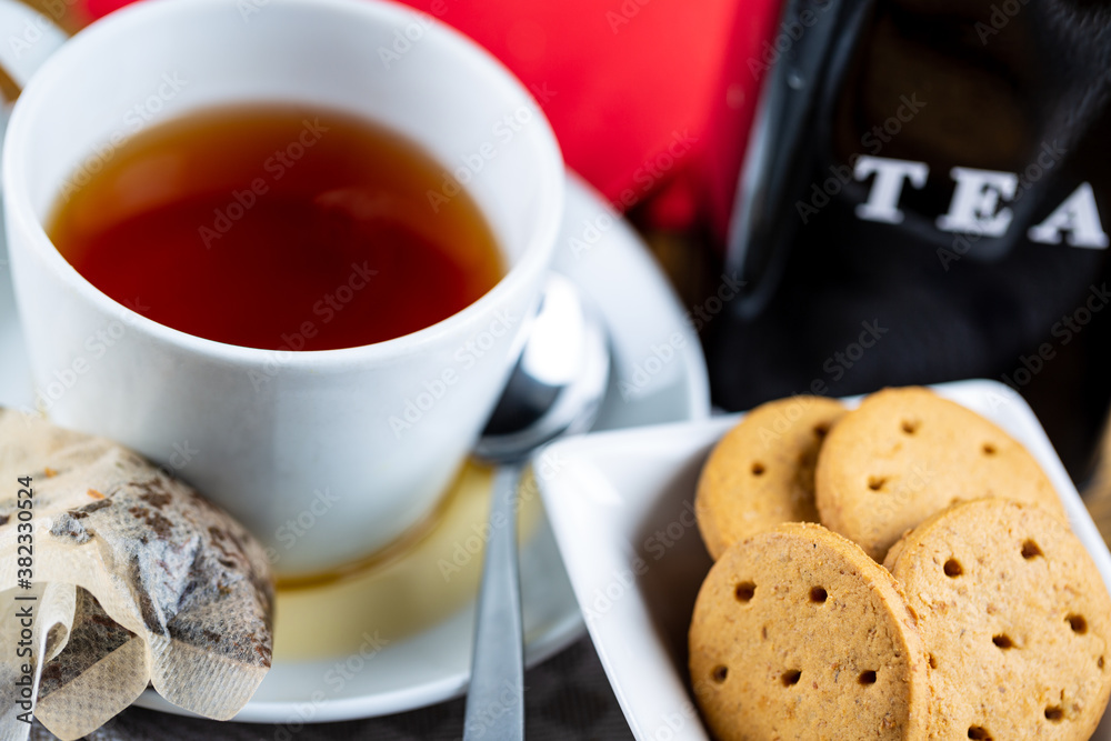 Tea breakfast with cookies. Selective focus on subjects.