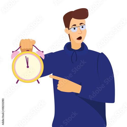 Don't waste time, deadline. Young man pointing to the time on the clock, frustrated for the delay in the deadline.