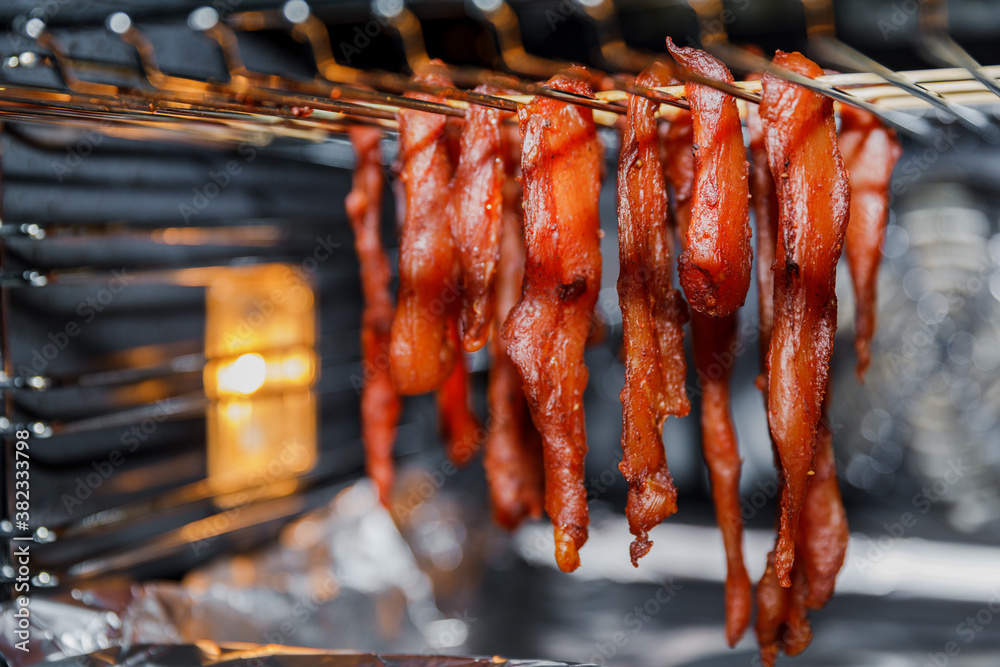 Cooking chicken jerky in the oven Stock Photo | Adobe Stock