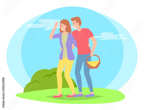 Young couple walks in nature, people looking for picnic place, summer time, guy carries basket of groceries. Bright sun, blue sky, green lawn. Cartoon flat illustration of people isolated on white
