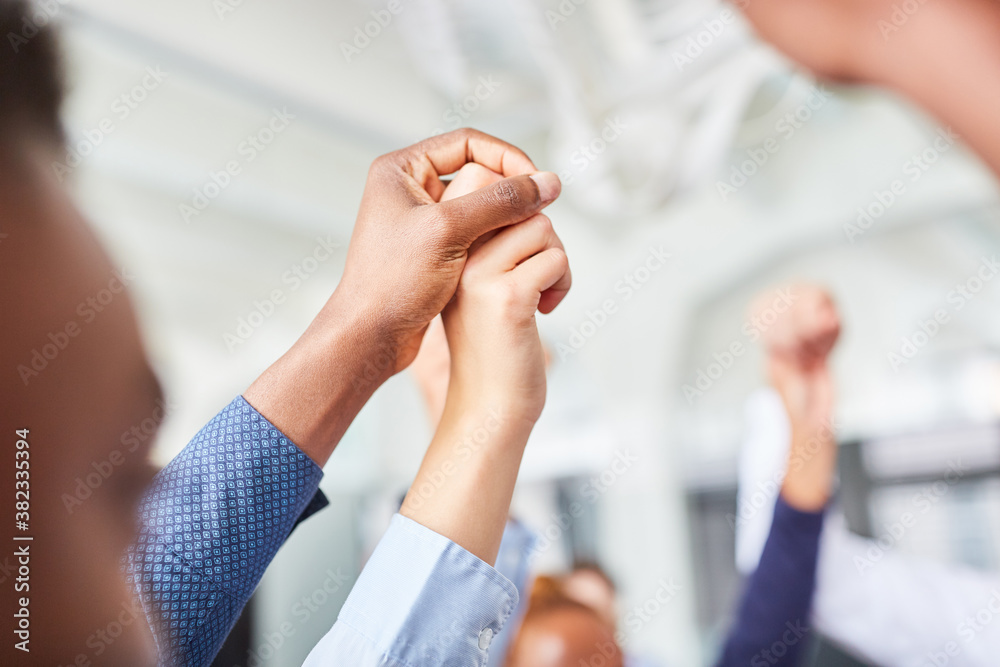 Business people hold hands for trust