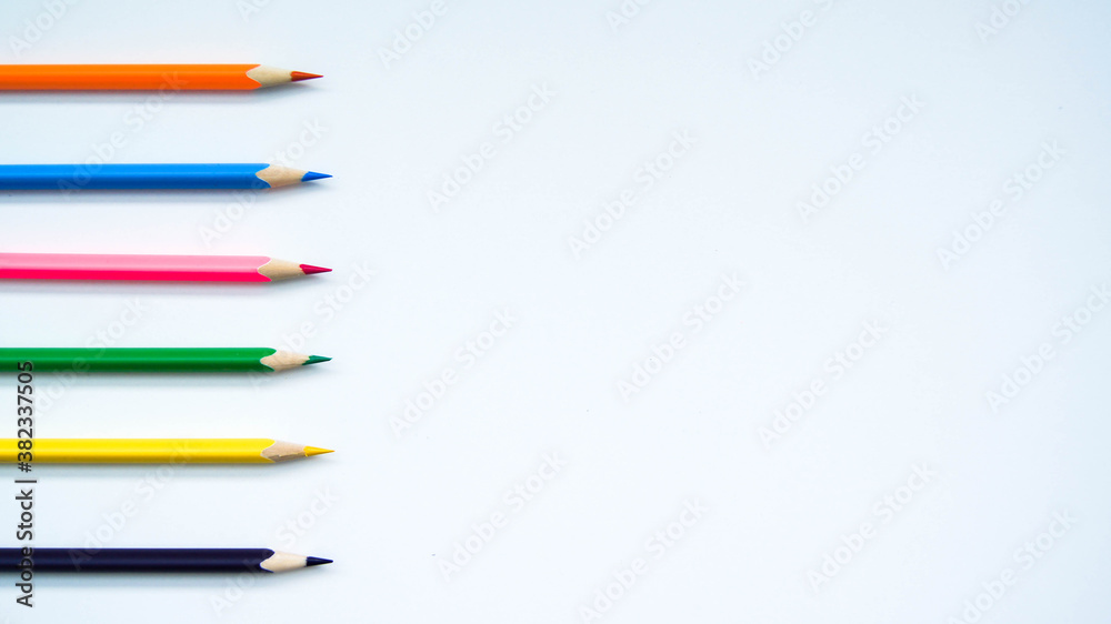 Multicolored set of wooden pencils on white background Multicolored set of wooden pencils on white background
