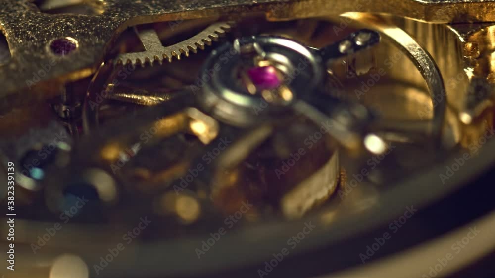 old clock mechanism with metal gears macro shot old clock mechanism with metal gears macro shot