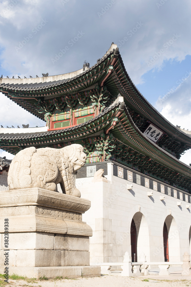 Fototapeta premium Gyeongbokgung palace landmark of Seoul, South Korea. roof with sky and cloud.