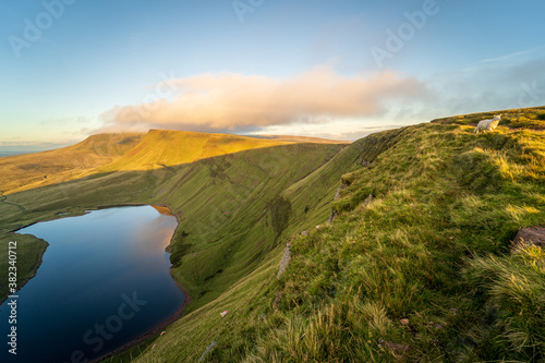 Llyn y Fan Fach, a lake on Black Mountain in Carmarthenshire in Summer, Brecon Beacons National Park, South Wales, the United Kingdom photo