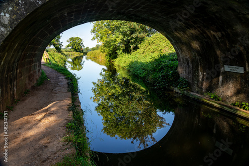 Foto Reflections of a canal bridge