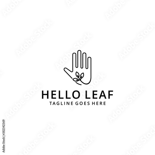 Illustration hand holding a nature green leaf sign logo design 