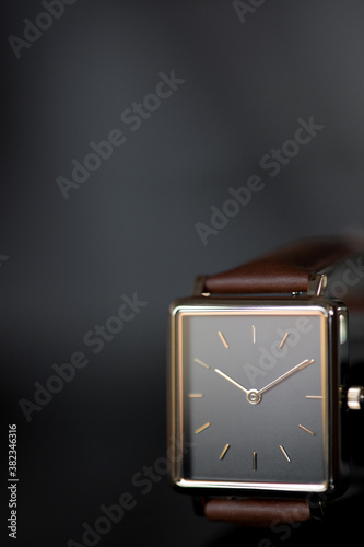 close up of woman watch with brown strap