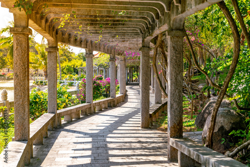 The beautiful flowers arch path in Nanshan Temple on Hainan in China
