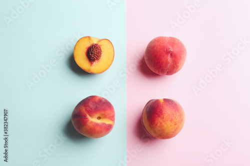 Fresh ripe peaches on color background, flat lay
