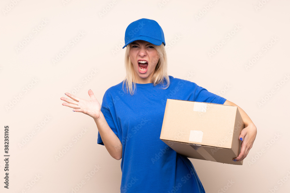 Young delivery woman over isolated background unhappy and frustrated with something Young delivery woman over isolated background unhappy and frustrated with something