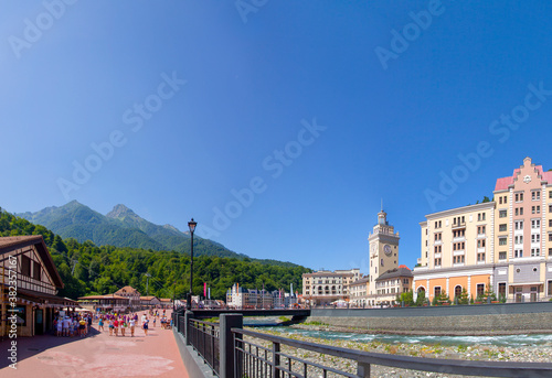 Obraz na płótnie Russia, Sochi, Rosa Khutor, Mzymta river, hotels on the embankment, tourists walking, August 2015 w salonie