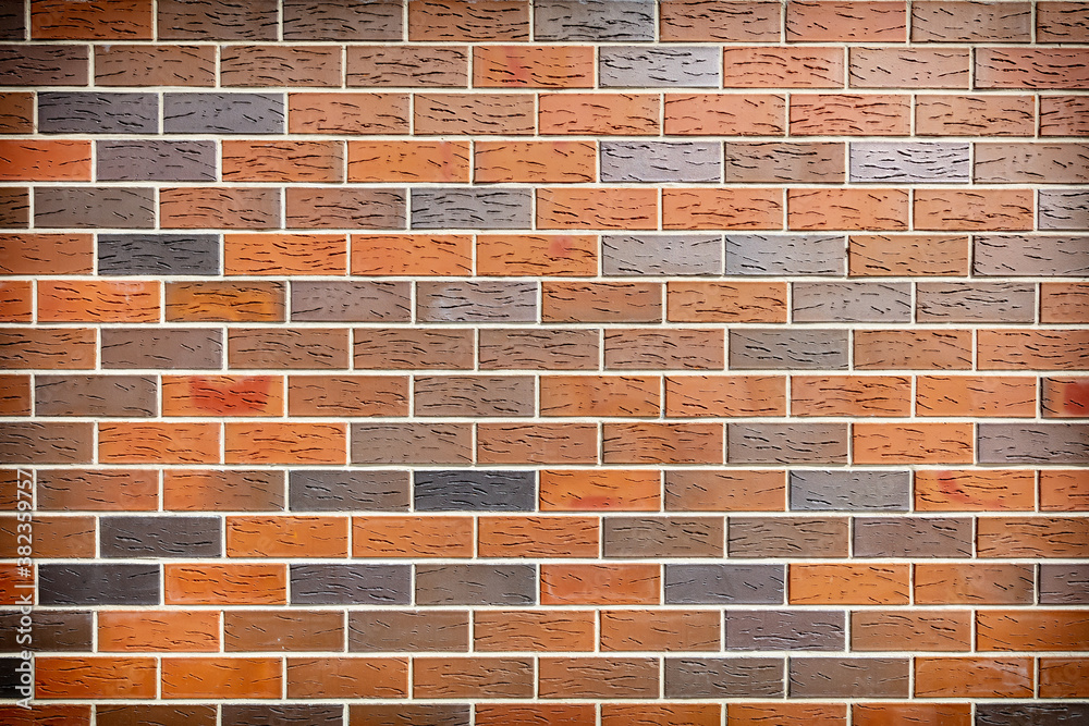 Fototapeta premium Red decorative brick in the wall as an background.