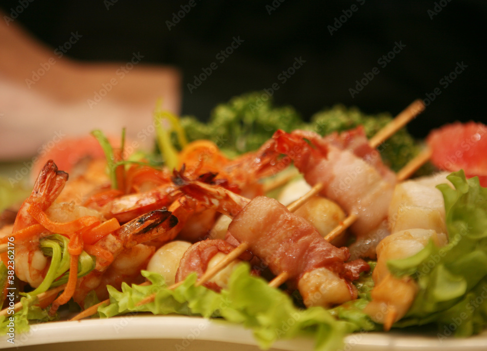 Barbequed prawn salad with shrimp lettuce and green lime