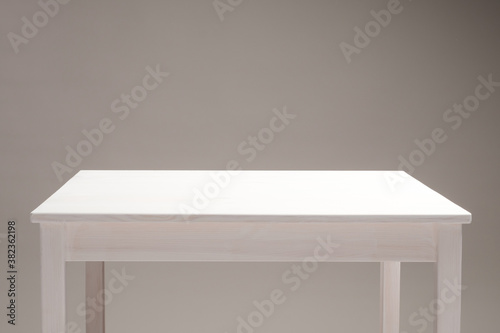 light wooden empty table surface, background beige dark