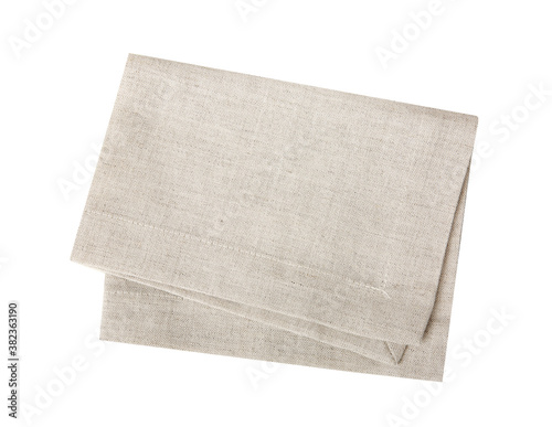 Kitchen towel isolated on white.Folded beige cloth.