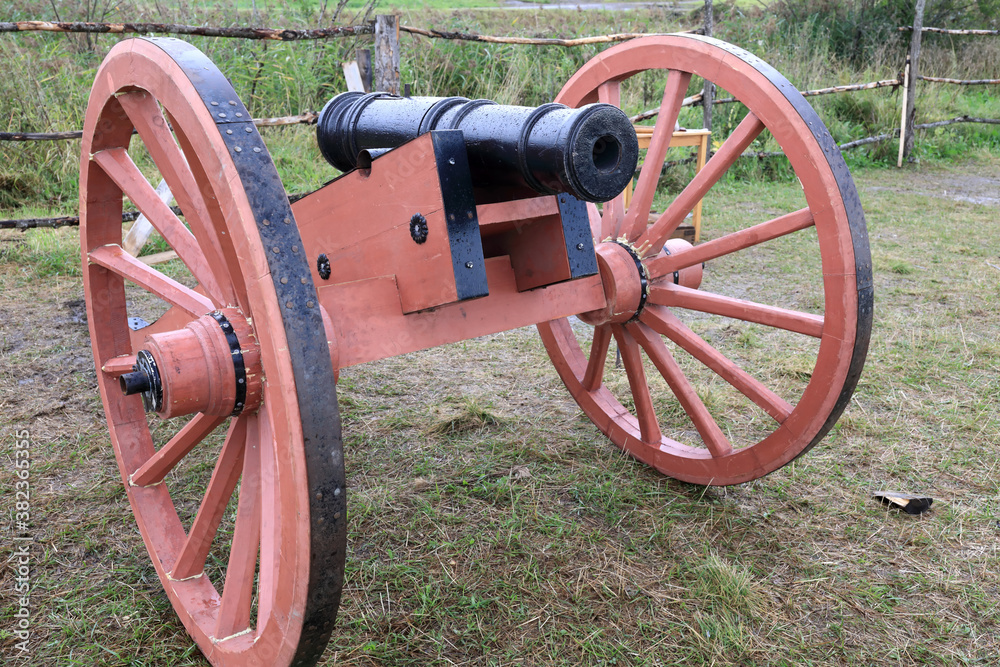 Ancient cannon on wooden wheels