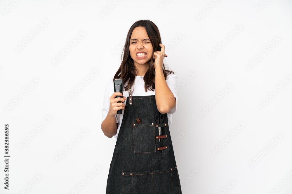 Young hairdresser woman isolated on white background frustrated and covering ears Young hairdresser woman isolated on white background frustrated and covering ears