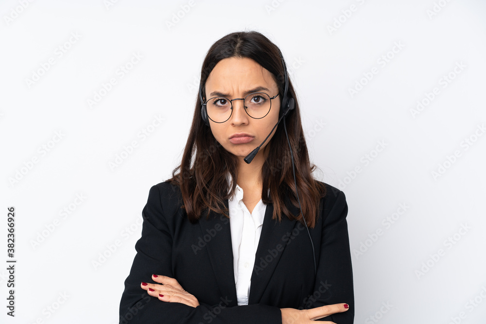 Young telemarketer woman isolated on white background feeling upset Young telemarketer woman isolated on white background feeling upset