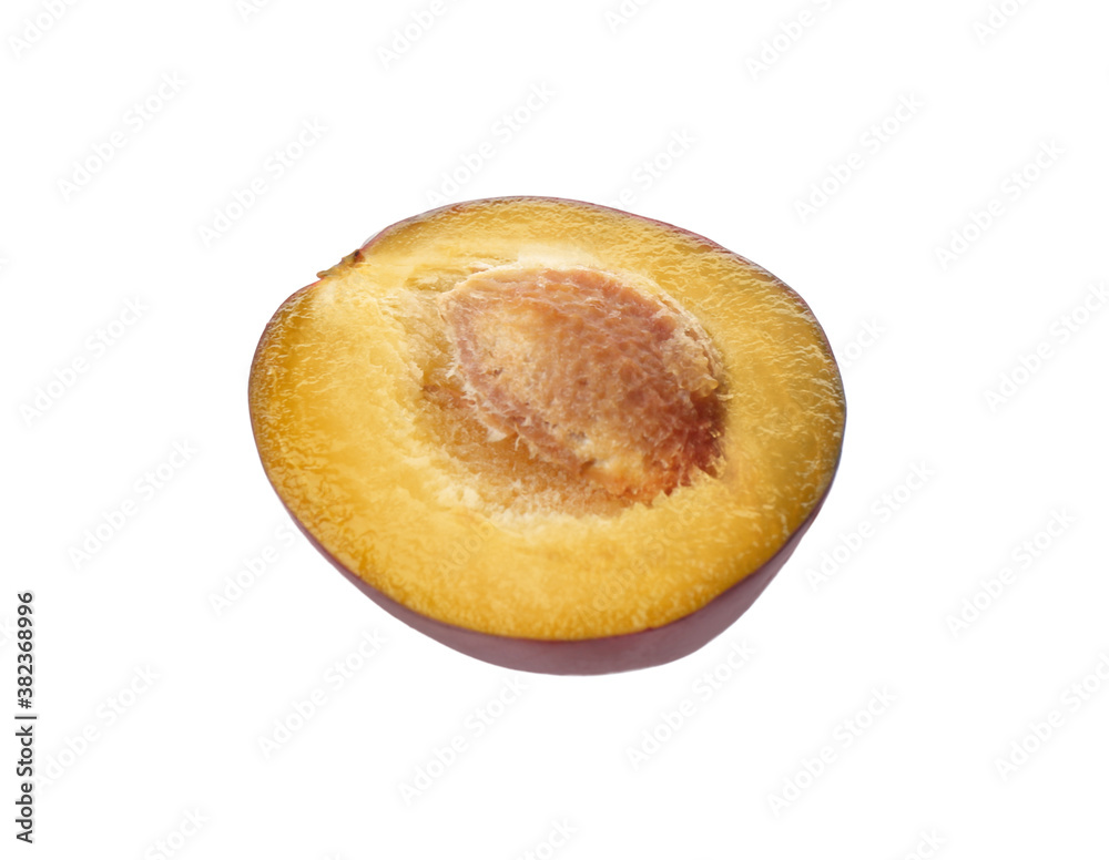 Half of ripe plum isolated on white Half of ripe plum isolated on white