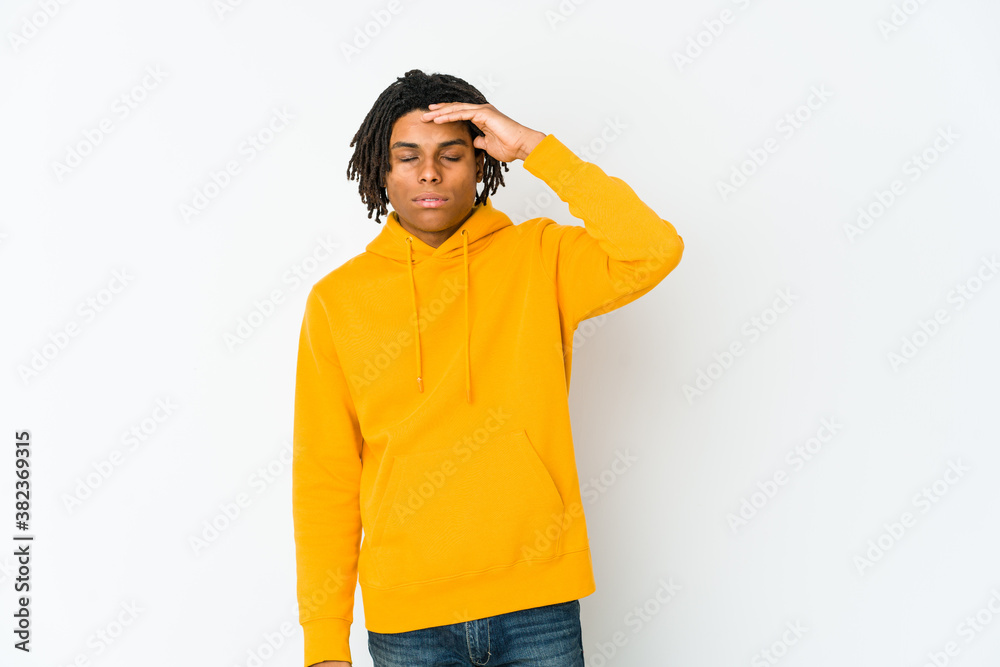 Fototapeta premium Young african american rasta man touching temples and having headache.