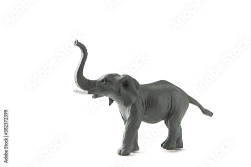 Elephant mini figure isolated on white background. Plastic animal toy  clipping path