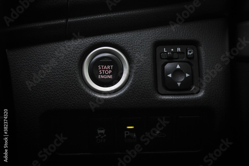 Close up engine car start button. Start stop engine modern new car button,Makes it easy to turn your auto mobile on and off. a key fob unique ,selective focus