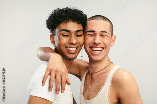 Happy young gay couple in love photo