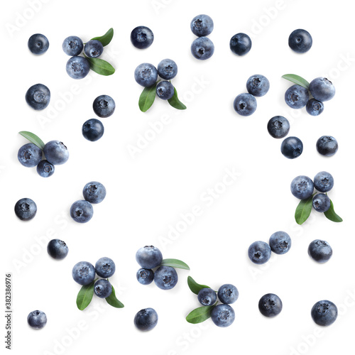 Frame of fresh blueberries on white background, top view