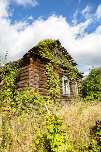 Old wooden abandoned house at the countryside