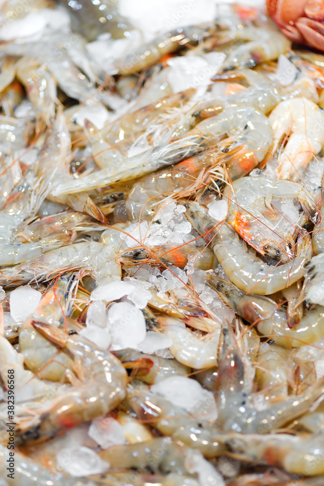 Seafood close-up backdrop from fresh natural raw shrimps.