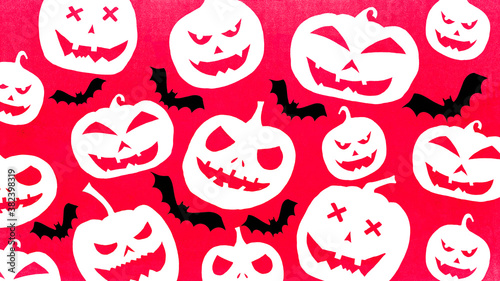 HALLOWEEN symbol background template design -White black silhouette of scary carved luminous cartoon pumpkins and bats isolated on red texture