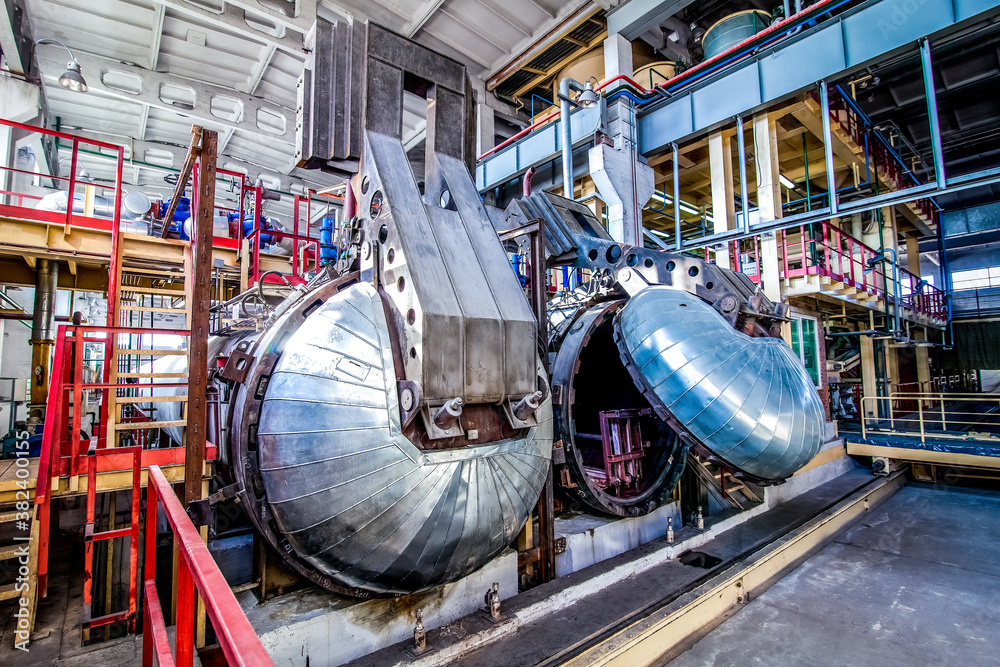 industrial equipment at the factory in large production hall industrial equipment at the factory in large production hall
