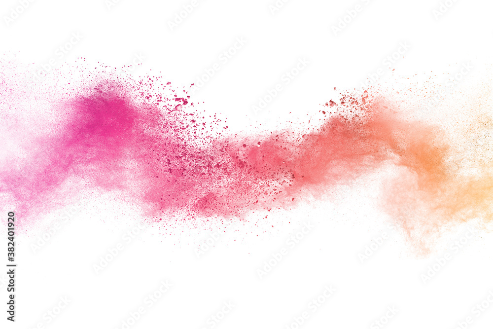 Freeze motion of colorful color powder exploding on white background. 