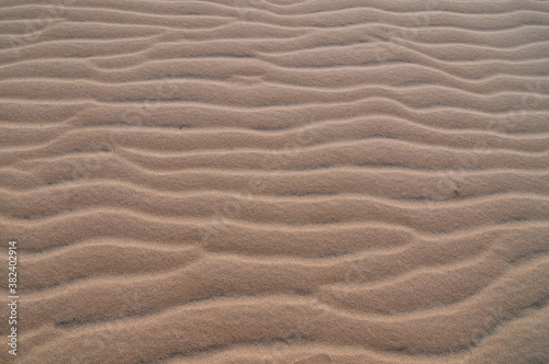 Figuras en la duna en la arena