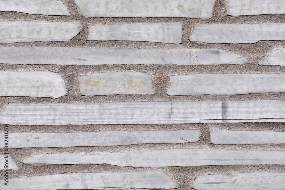 Decorated stone wall of the a building in Finland.