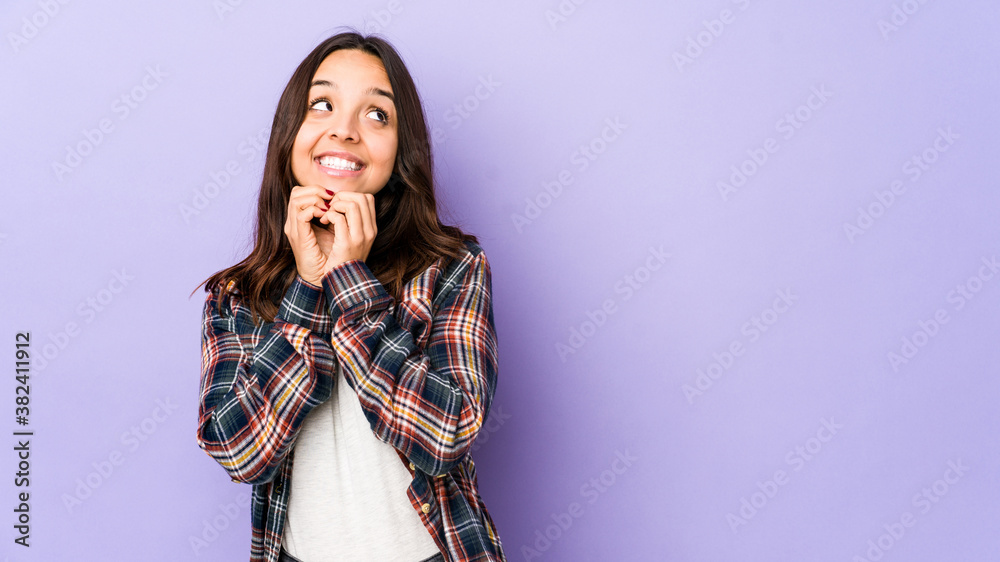 Young mixed race hispanic woman isolated making up plan in mind, setting up an idea. Young mixed race hispanic woman isolated making up plan in mind, setting up an idea.