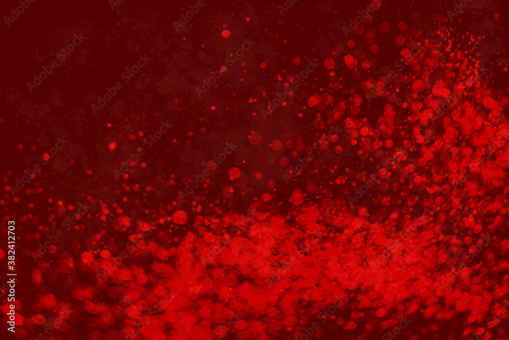 red festive background with bokeh and glitter