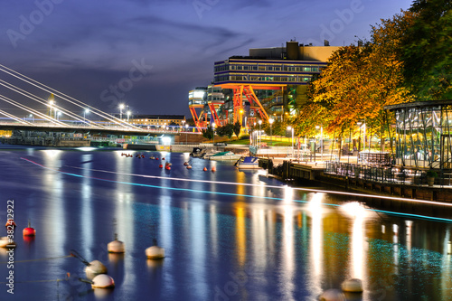 Evening view of Ruoholahti channel in Helsinki, Finland. Autumn cityscape at night.