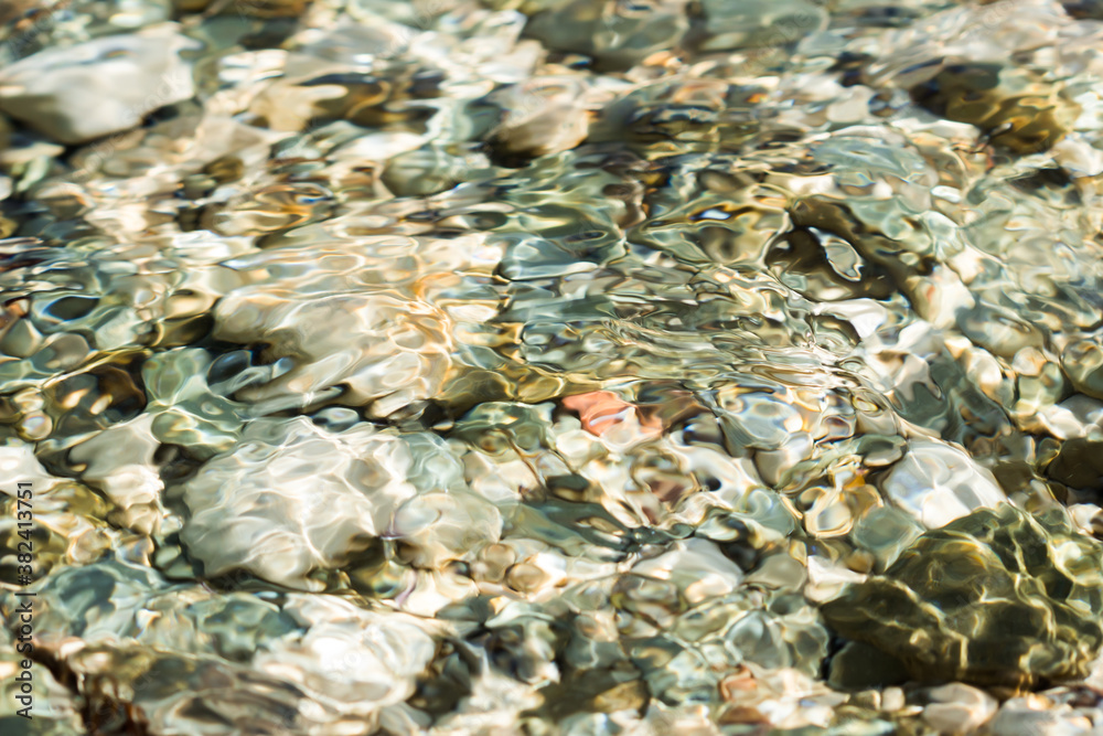 The pebbles of the stone beach in Feodosia, the Black Sea coast, Eastern Crimea. The pebbles of the stone beach in Feodosia, the Black Sea coast, Eastern Crimea.