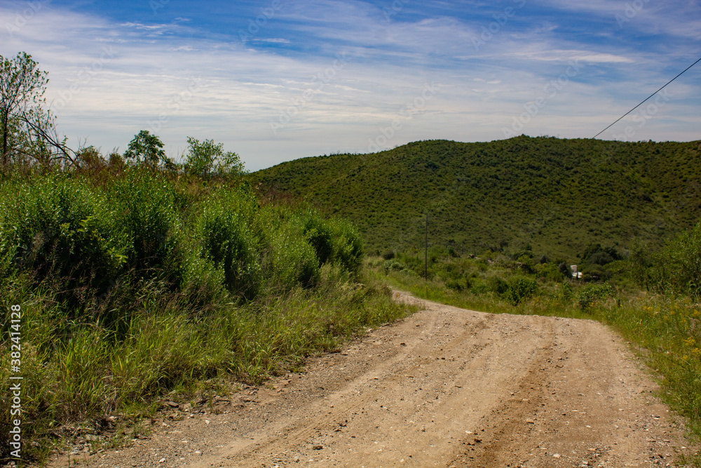 Fotografie Rural road on the mountains